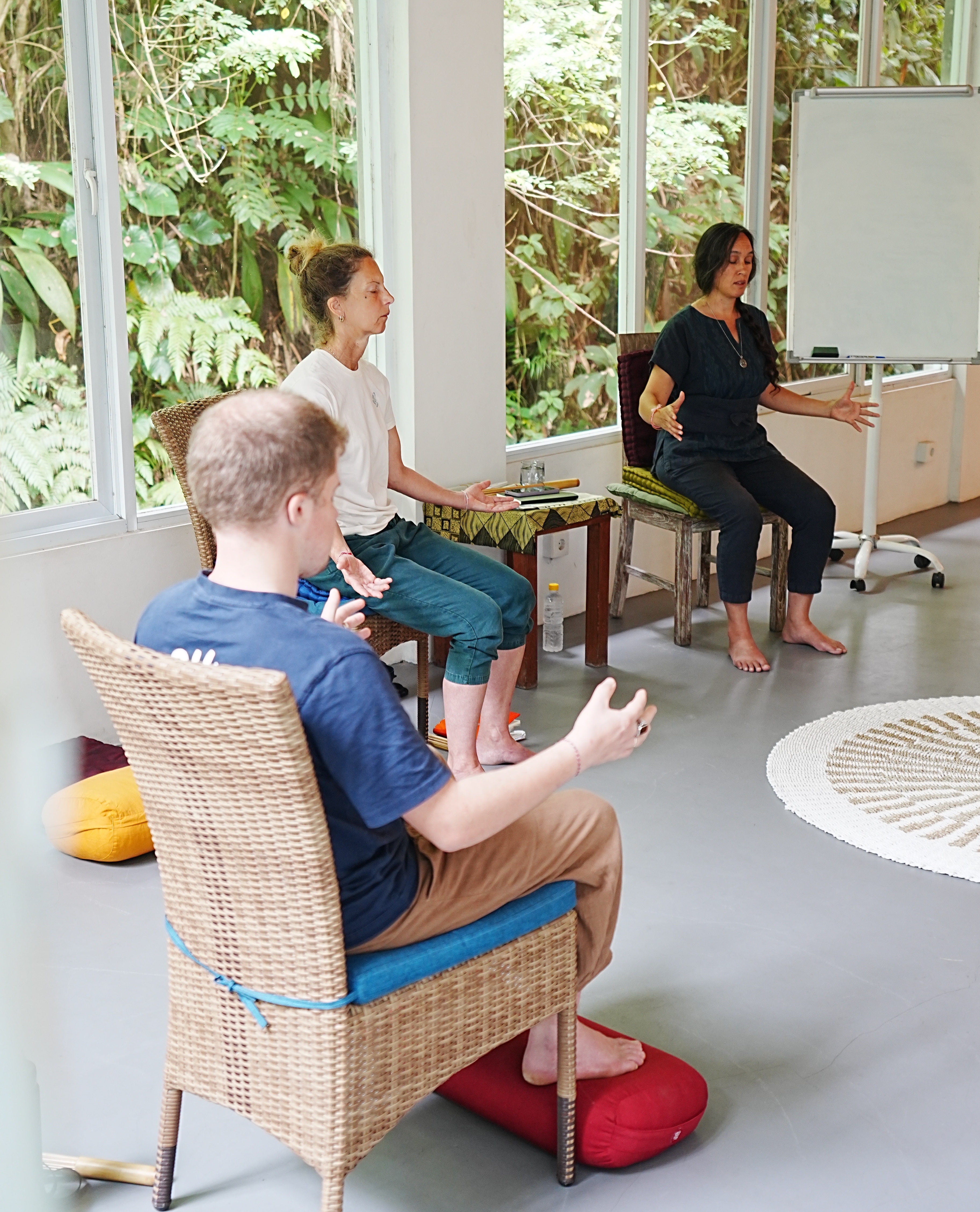 Marissa guiding a Qigong practice